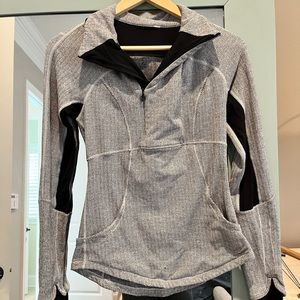 Lululemon gray/black pullover. Size is cut out but it’s either a 0 or 2